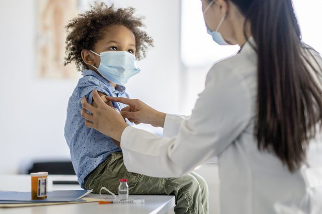 Kid Boy Receiving a Vaccine Shot During a Pandemic